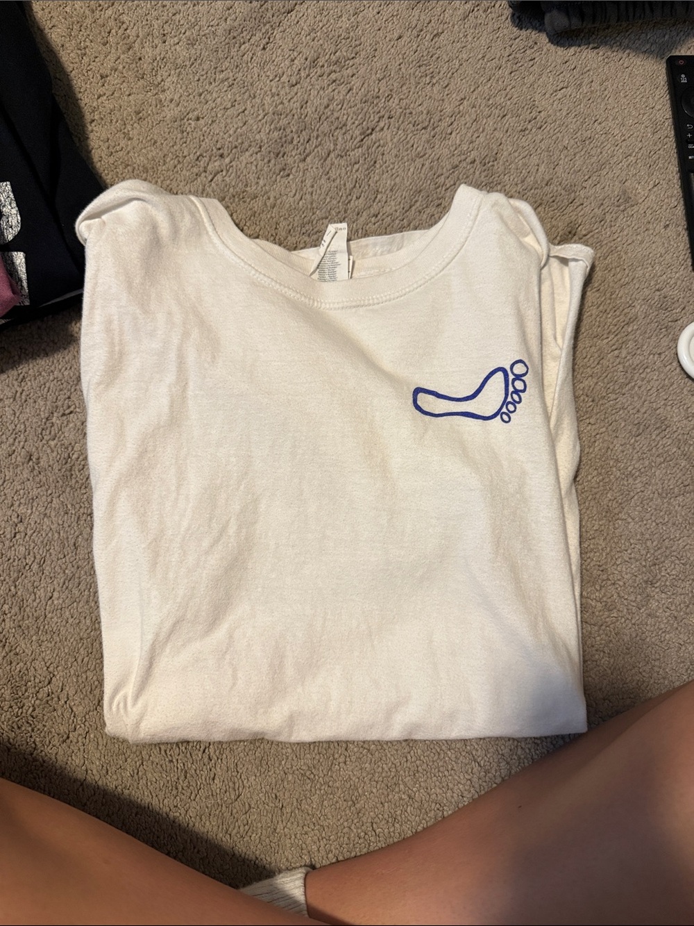 Cream Short-Sleeve Tee with Blue Footprint Graphic